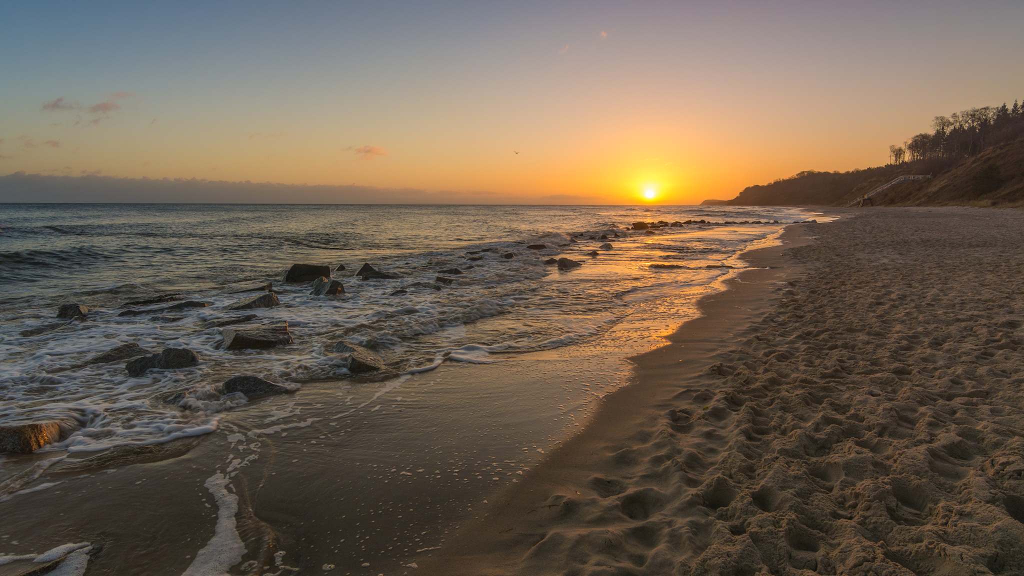 Sonnenuntergang an einem Strand.