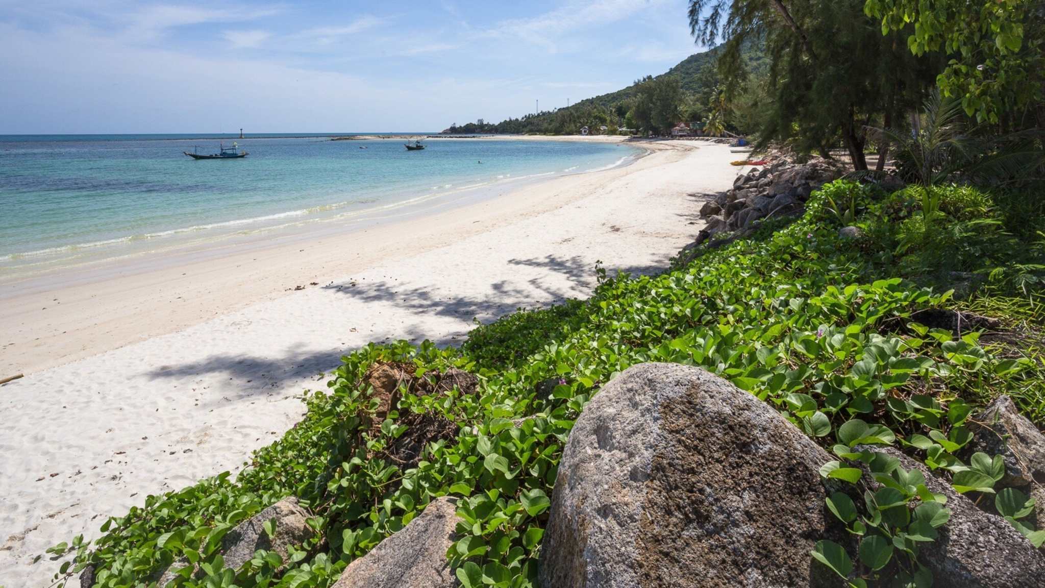 View Of Beach Against Cloudy Sky