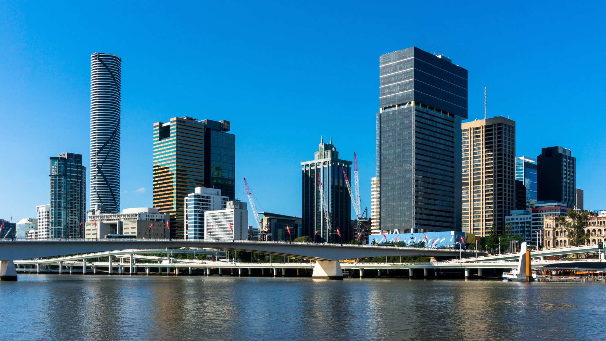 Low Angle View Of Skyscrapers Against Blue Sky