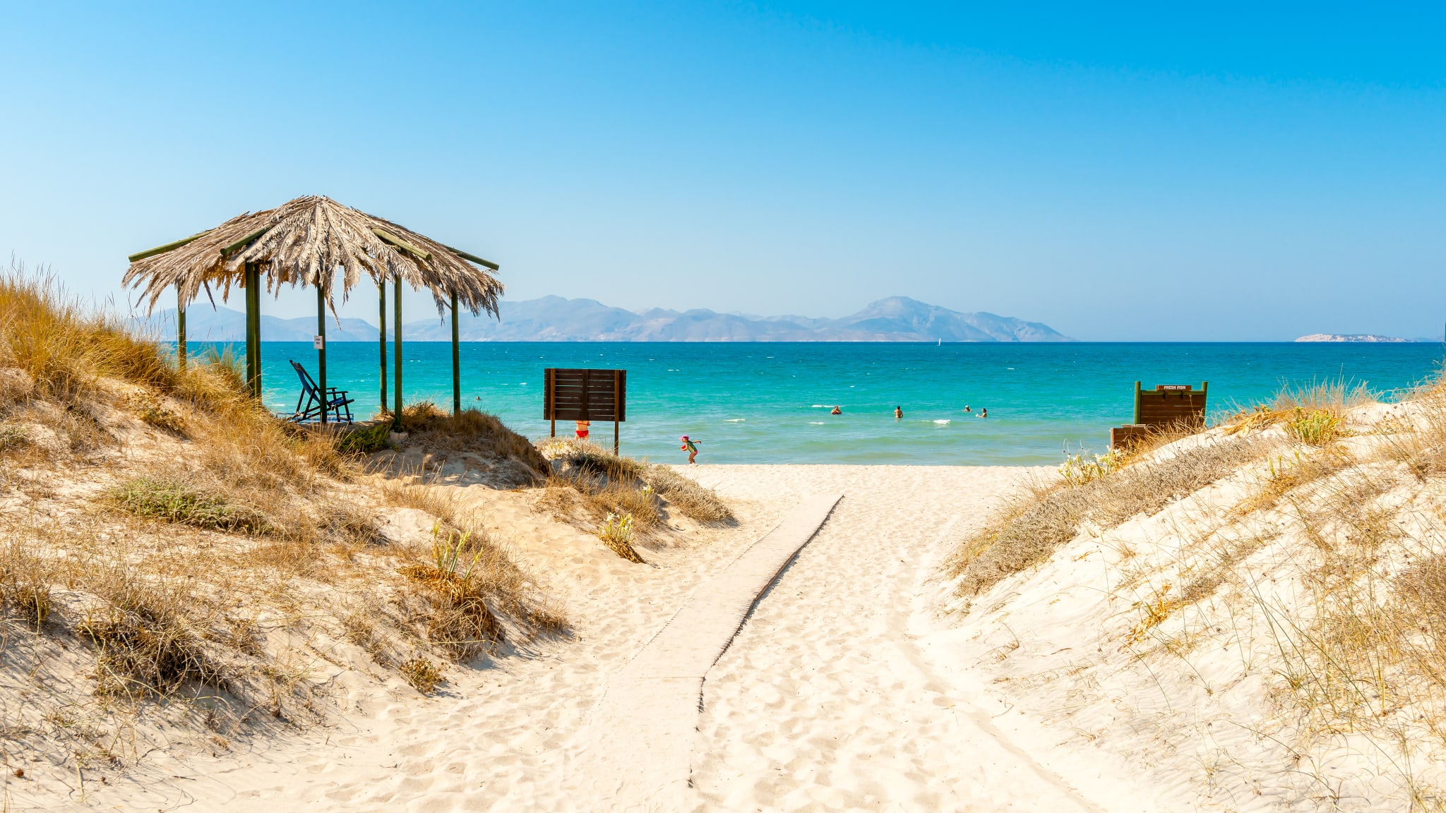 The way to an exotic sand beach in Kos island in Greece.