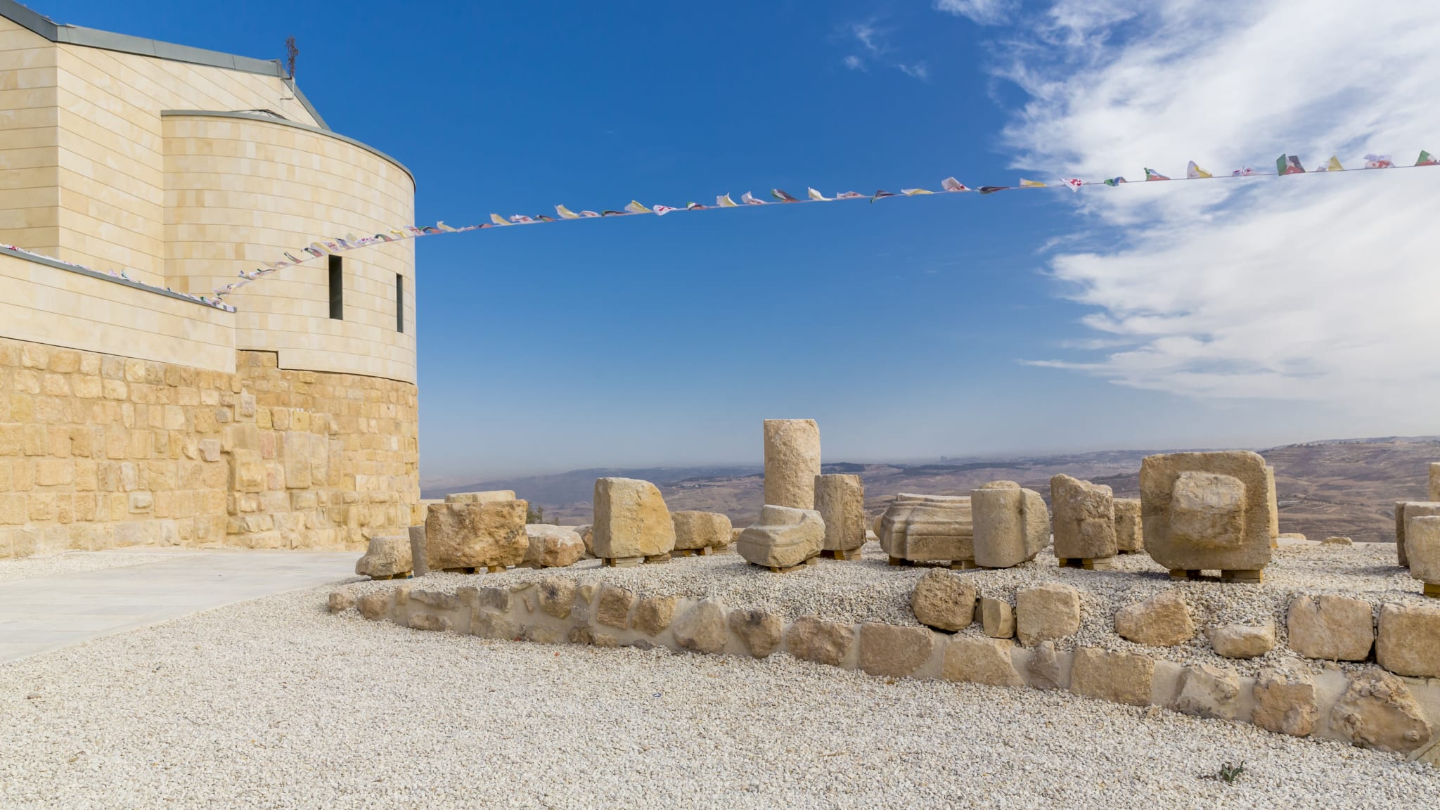 Jordan, Madaba, Province, view to New Church and stones of the old Memorial Church