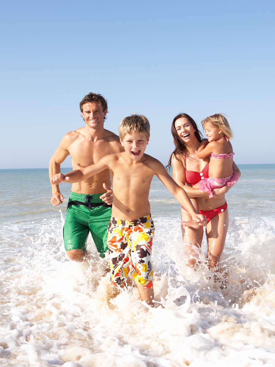 Familie am Strand © stock.adobe.com - Monkey Business