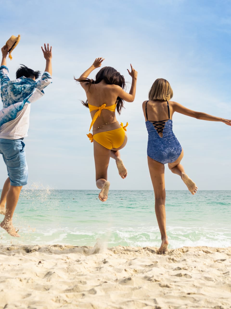 Teenager am Strand