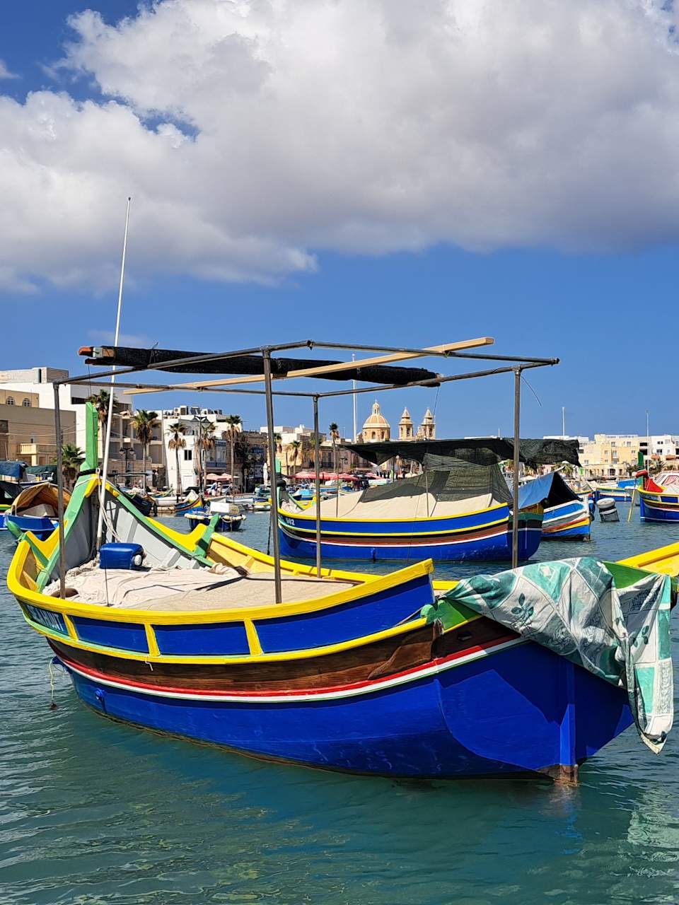 Luzzus auf dem Wasser, Marsaxklokk, Malta © Philip Bucher
