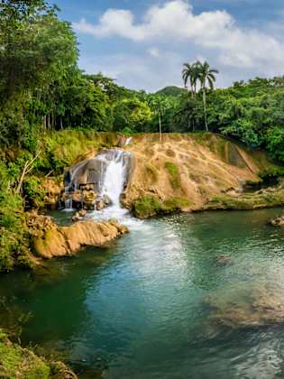 El Nicho Wasserfälle, Kuba © Eloi_Omella/iStock / Getty Images Plus via Getty Images