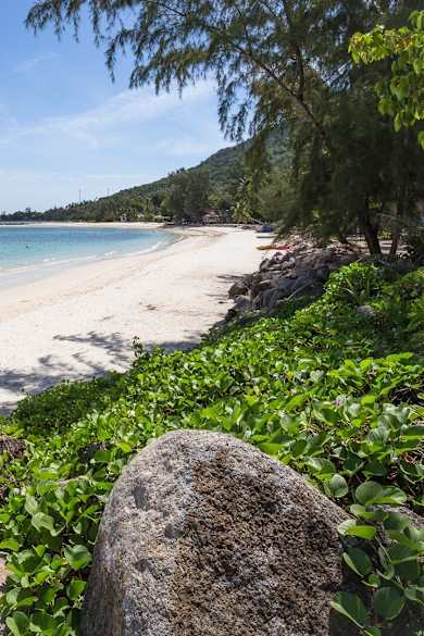 View Of Beach Against Cloudy Sky