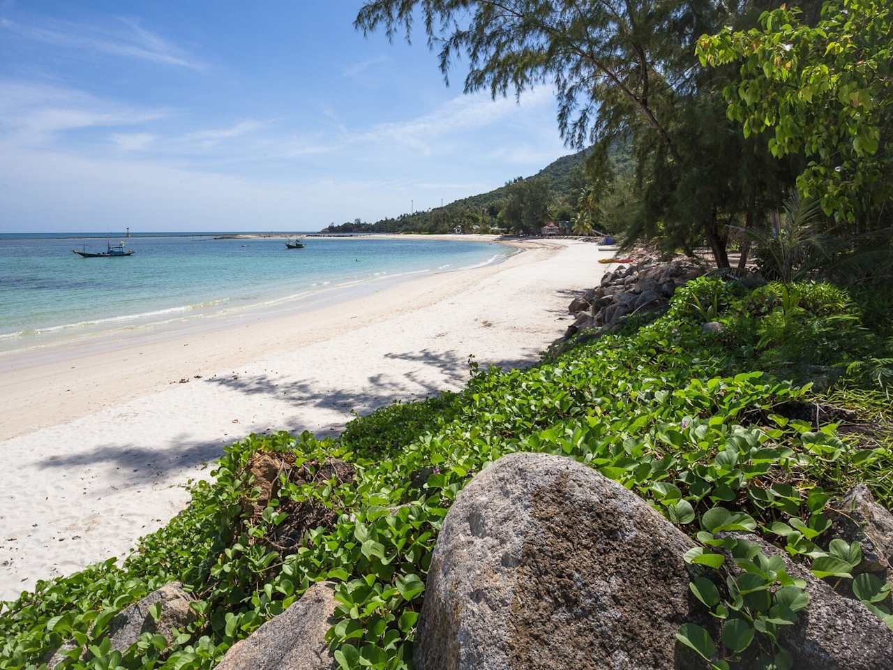 View Of Beach Against Cloudy Sky
