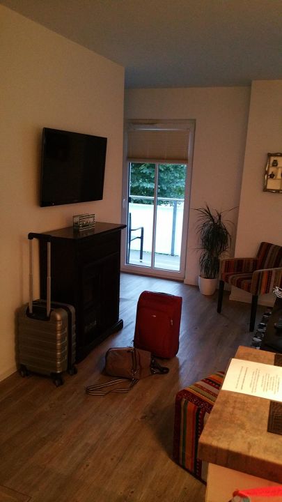 "Der Fernseher und Elektrische Kamin im Wohnbereich" Aparthotel