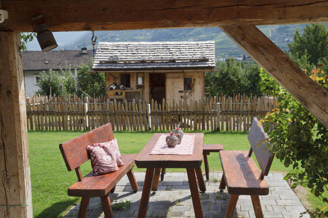 "Gemütliche Sitzecke im Garten" Neuhauserhof (Merano
