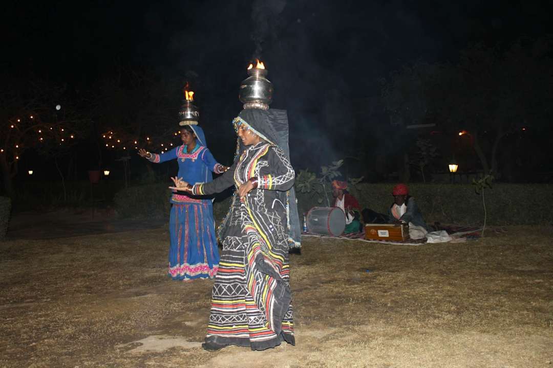 Local artists dancing Hotel Mirvana Nature Resort
