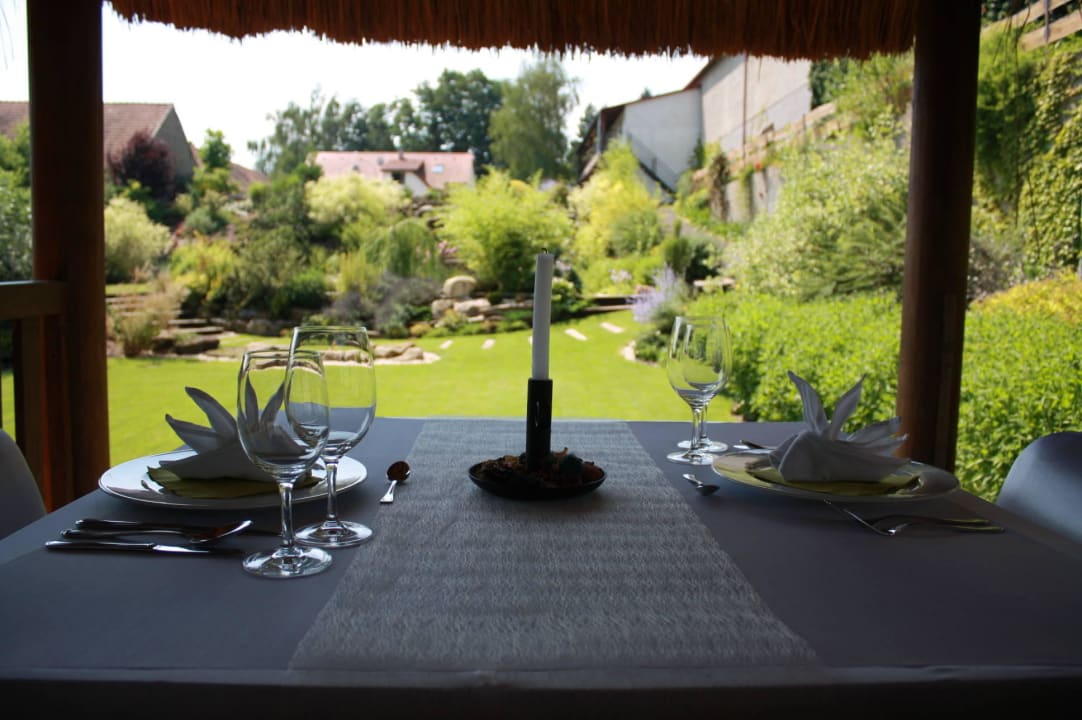 Privat table in garden Hotel Lony