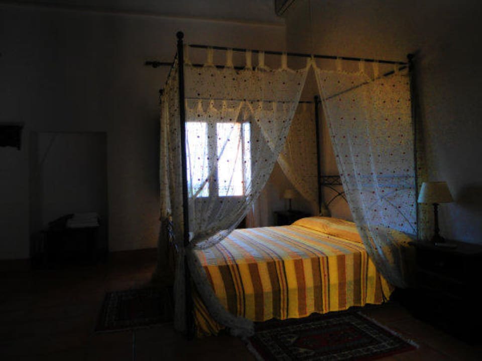 Wrought Iron, hand-made bed frame in the cozy room Agriturismo Sanacore