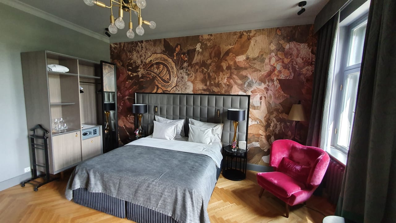 Zimmer Grand Poet Hotel by Semarah