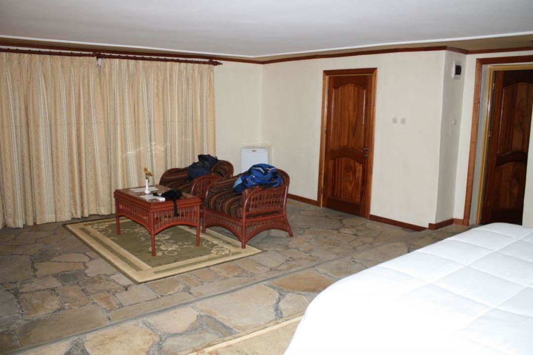 Sitzgruppe vor dem Kamin Gorilla Montain View Lodge