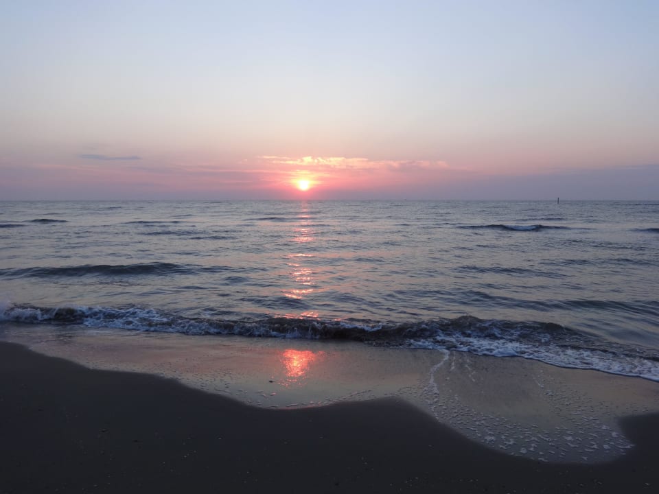 Sonnenaufgang am Strand Villaggio Camping Adria