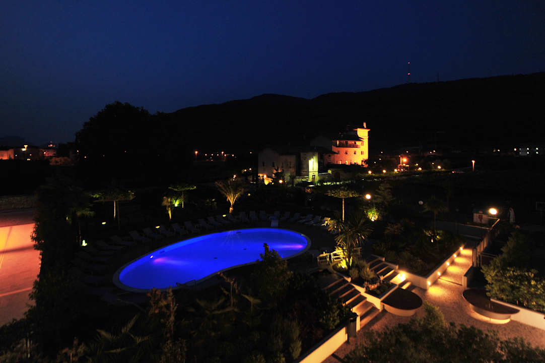 Pool by night 4 Limoni Apartment Resort
