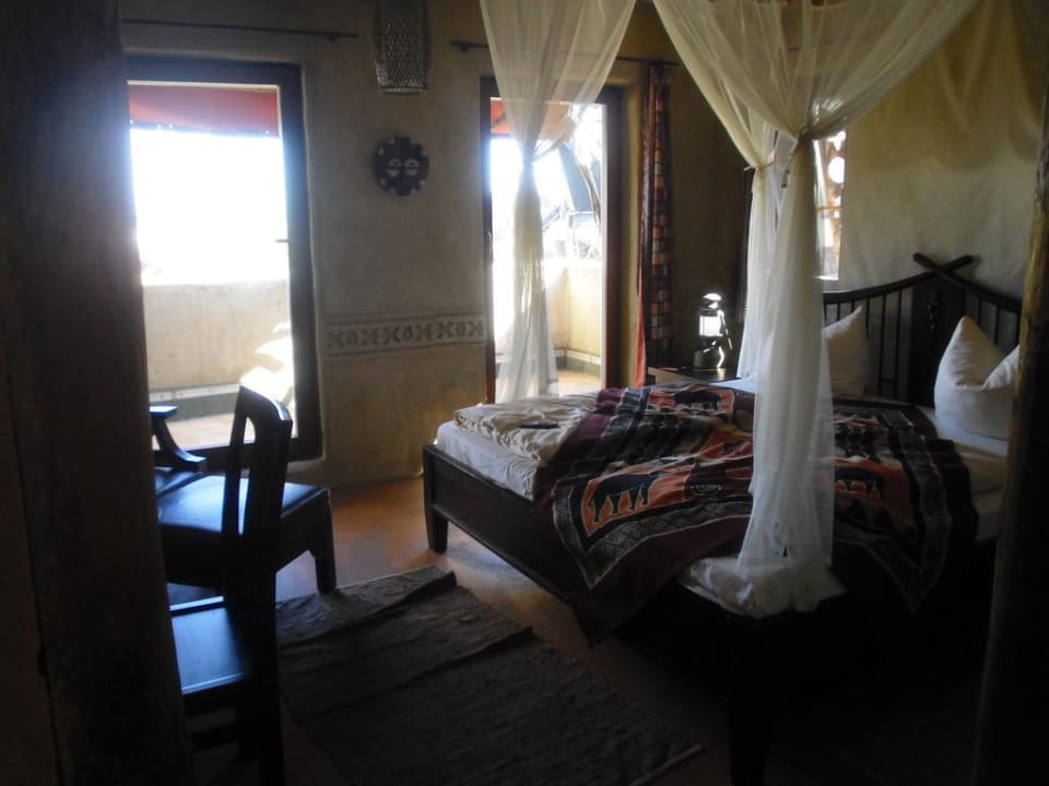 Schlafzimmer mit Zugang zum Balkon Hotel Matamba - Phantasialand Erlebnishotel
