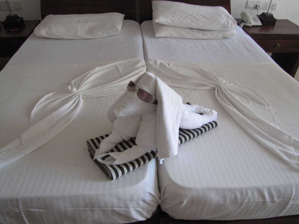 Handtuchdeko auf dem Bett Goldi Sands Hotel