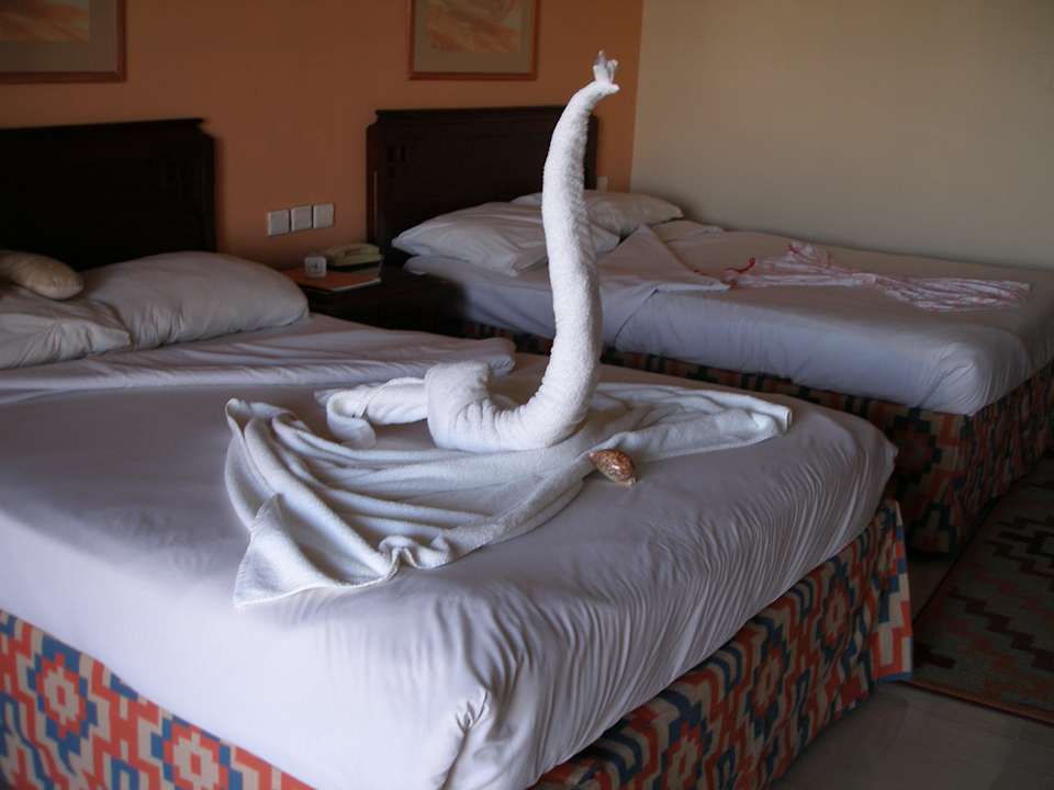 Dekoration der Betten SUNRISE Holidays Resort (Adults Only)