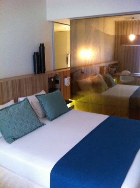 Bett mit Dusche Inspira Liberdade Boutique Hotel