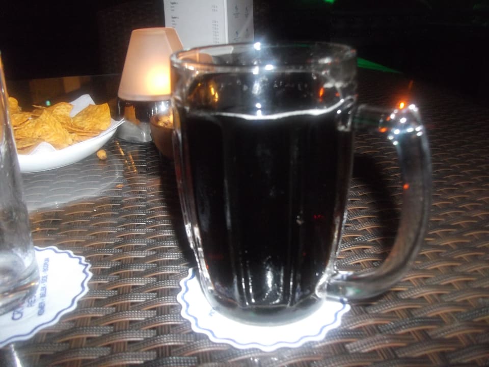 Dunkles Bier im Glas - schmeckt Diamond Excellence Resort & Spa
