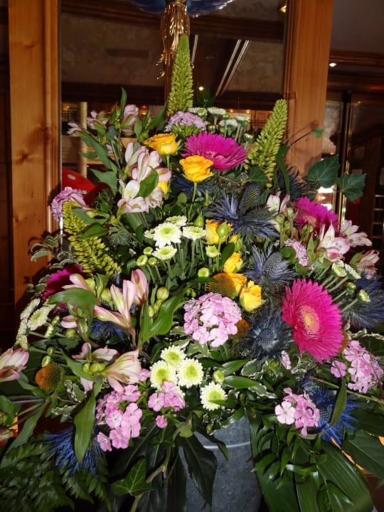 Blumengesteck an der Anmeldung Oberjoch - Familux Resort