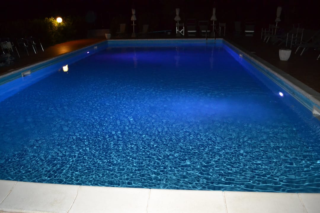 Pool in the night Residence La Casaccia