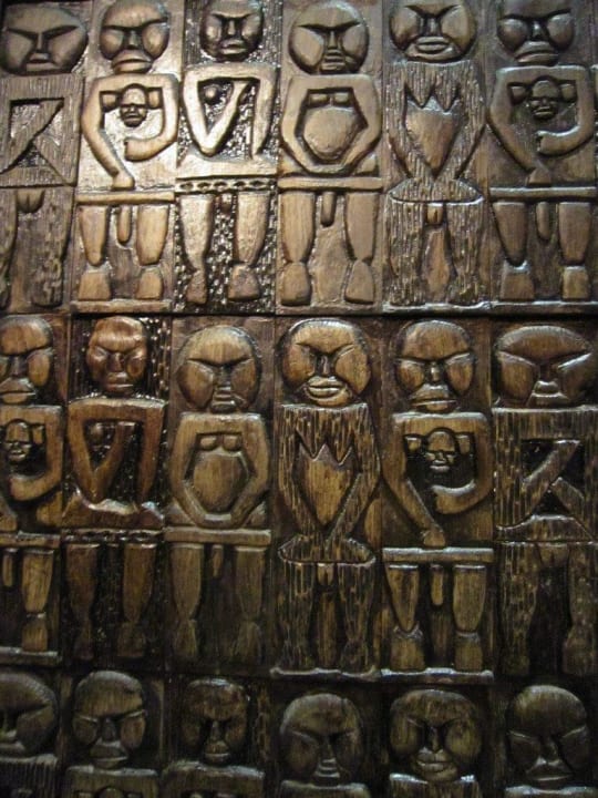 Wood carving on the door to the Grand Salon Lopesan Baobab Resort