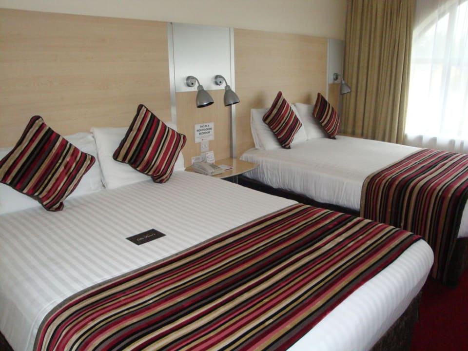 Betten im Zimmer 409 Da Vinci's Hotel