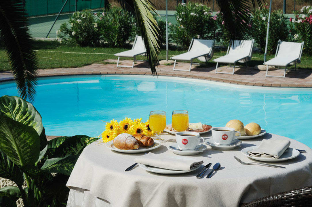 Breakfast near the pool  Alghero Resort Country Hotel