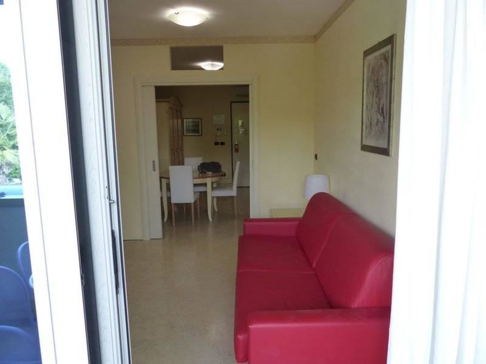 Suite - Wohnzimmer vom Balkon aus gesehen Hotel Residence Relais Du Lac