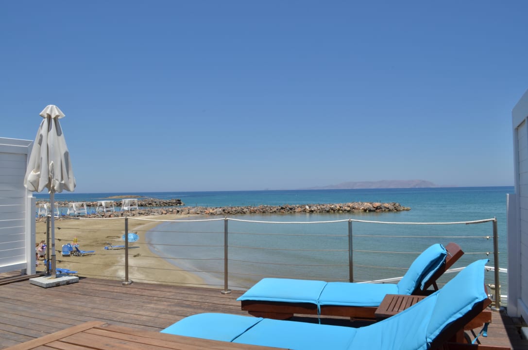 Terrasse mit Meerblick Knossos Beach Bungalows Suites Resort & Spa