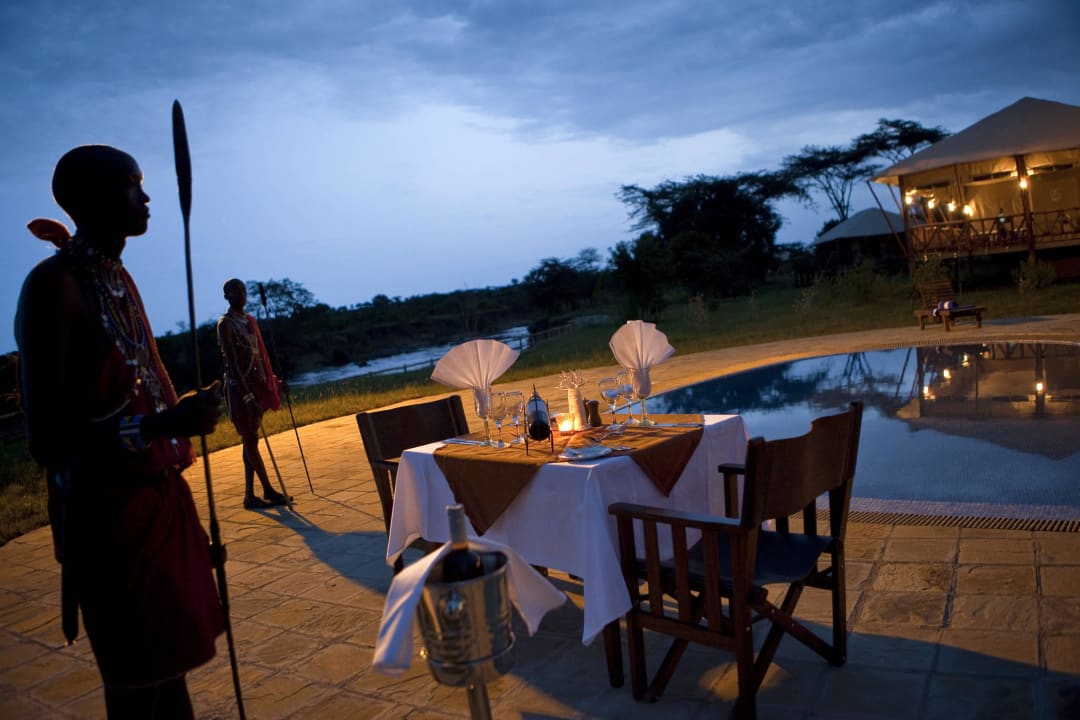 Dinner at the pool Neptune Mara Rianta Luxury Camp