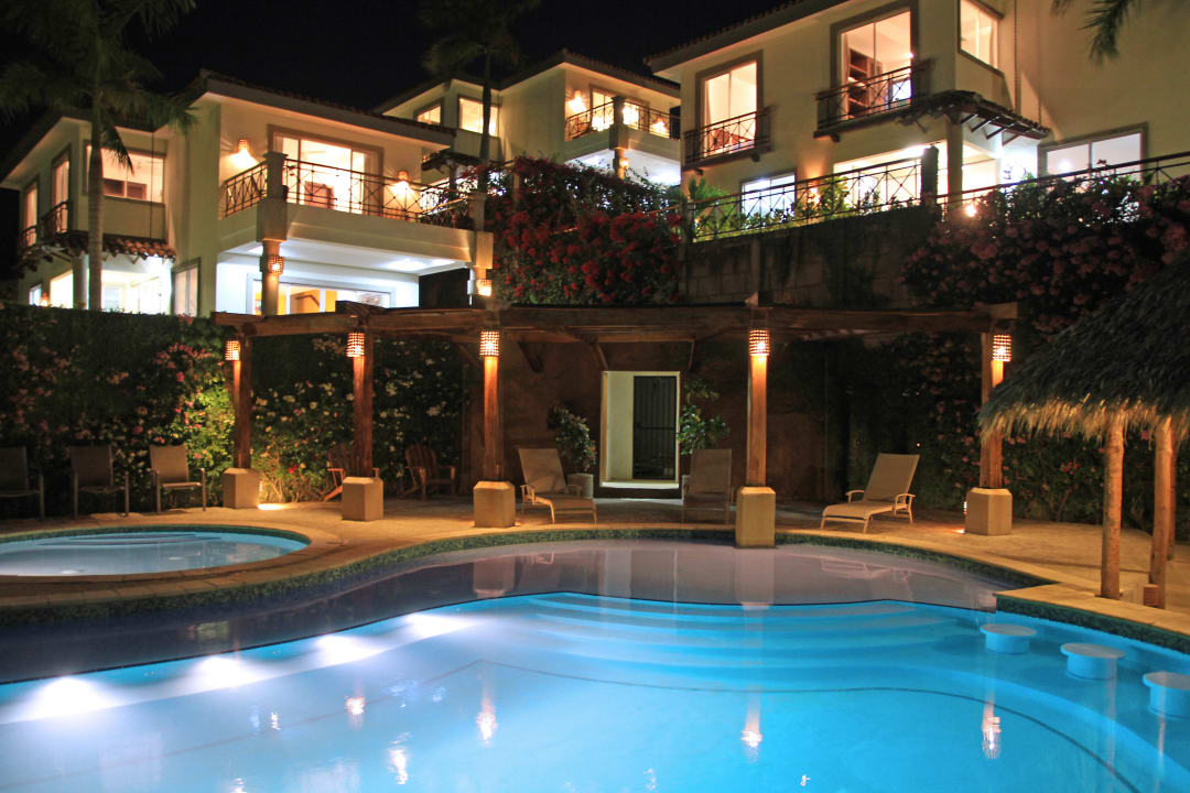 Swimming pool during at night Bahia del Sol Villas