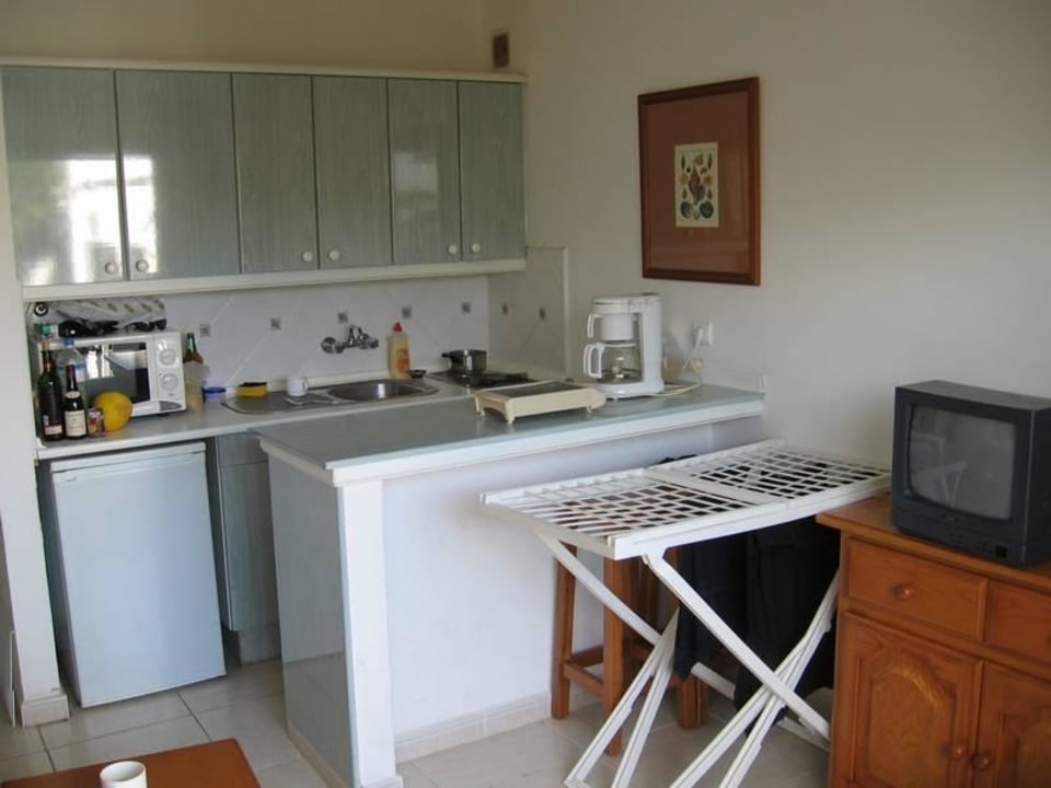 Wohnzimmer mit Küchenzeile Hotel Bahia Calma Beach Casa Catalina