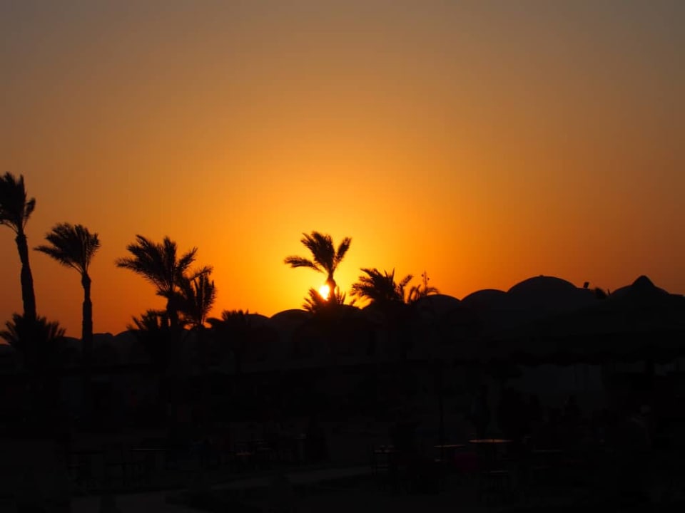 Zachód słońca Three Corners Sea Beach Resort