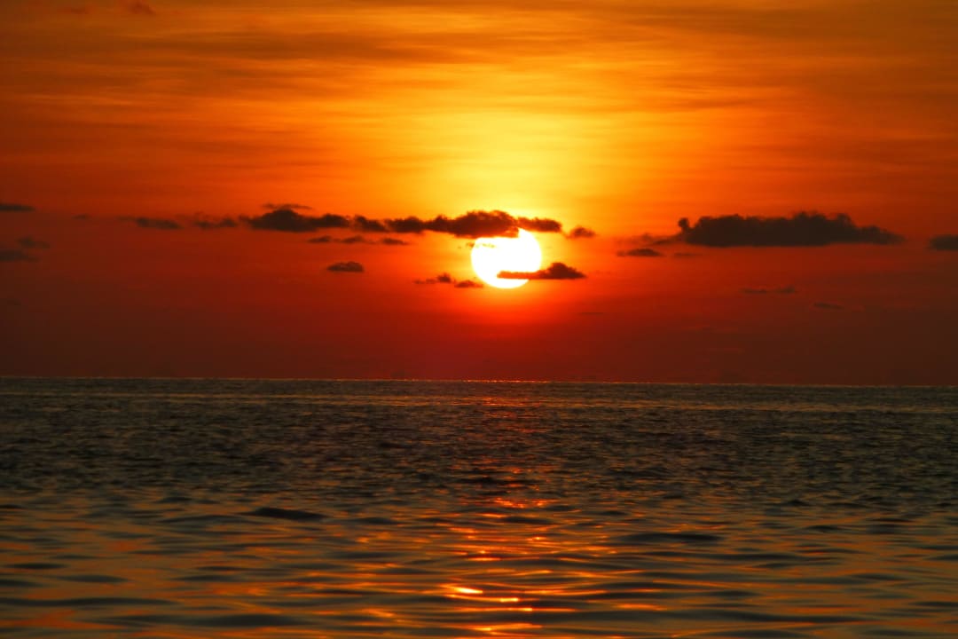 Mal ein Sonnenuntergang Embudu Village