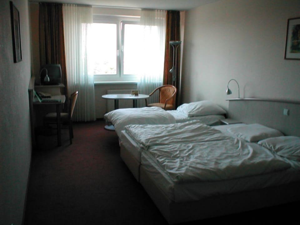 Dreibettzimmer Hotel Panorama Inn und Boardinghaus