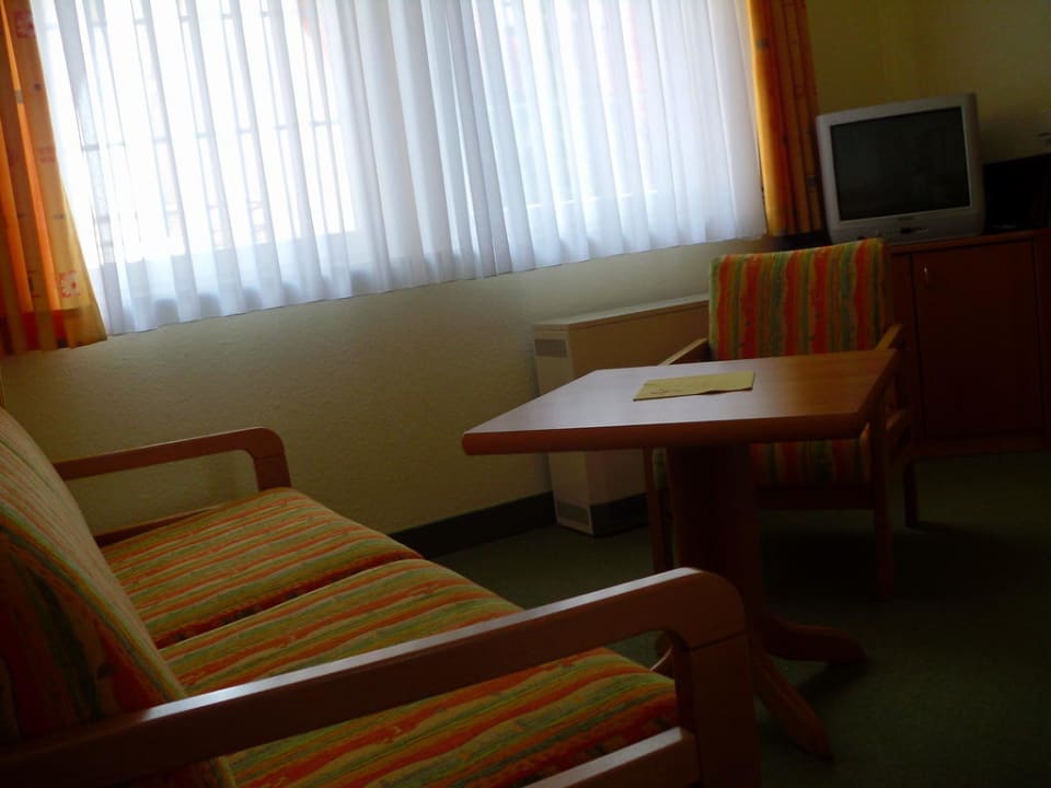 Sitzecke mit Fernseher  Landhotel Alte Mühle