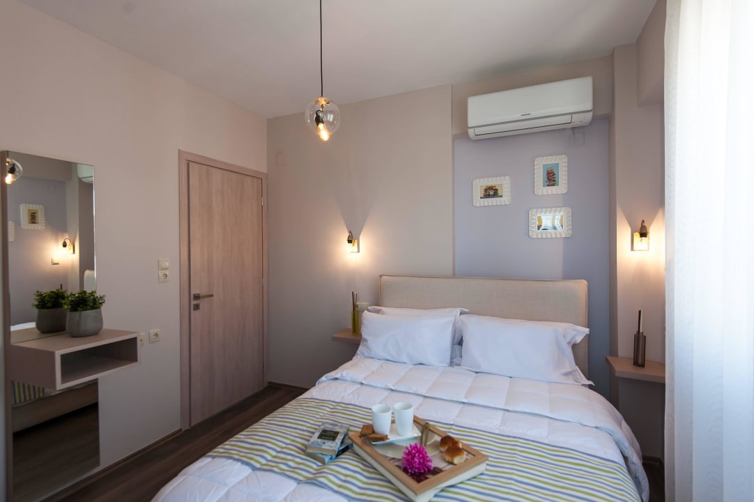 Bedroom with double bed Harmony of Nature Villas Adelianos Kampos