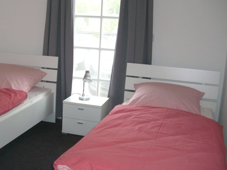 Schlafraum 2 mit Einzelbetten Ferienwohnung Kleine Brise