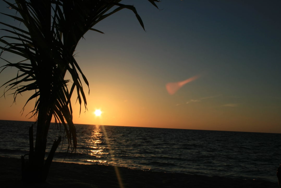 Sonnenuntergang Centara Ras Fushi Resort & Spa Maldives