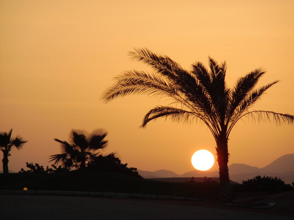 Sonnenuntergang Three Corners Sea Beach Resort