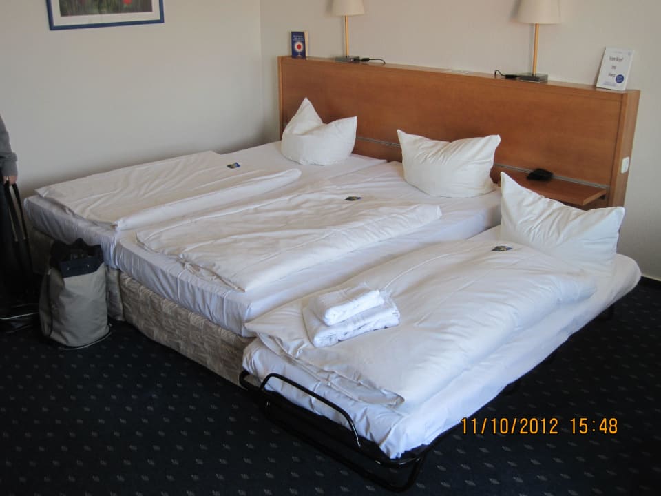 Doppelbett mit Beistellbett Upstalsboom Hotel am Strand