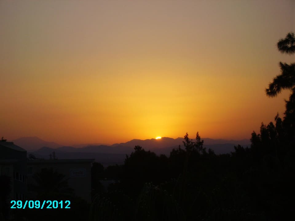 Ein wunderschöner Sonnenaufgang Asteria Collection Side