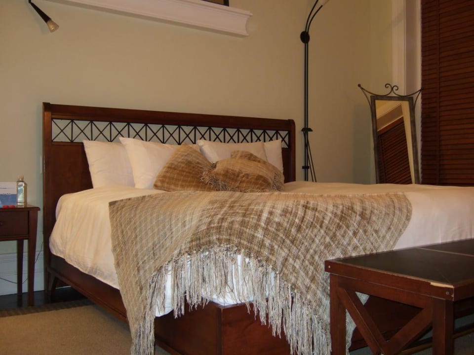 Zimmer Le Place d'Armes Hotel & Suites