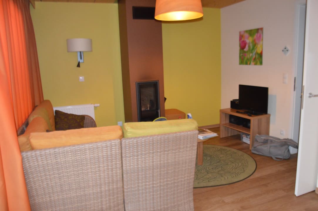 Wohnzimmer mit Kamin Center Parcs Park Bostalsee