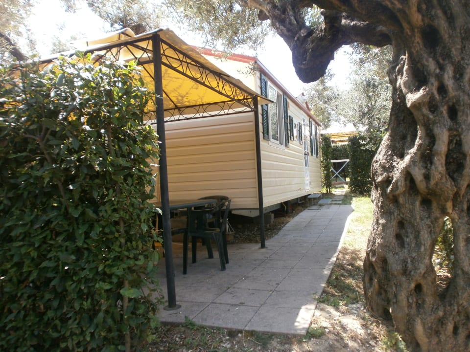 Unser Mobilheim mit Terrasse Camping Europe Garden