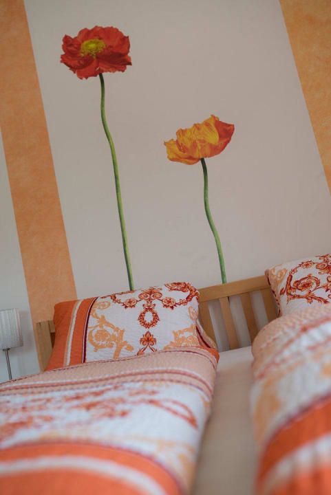 Liebevoll und individuell gestaltete Zimmer Pension Urania