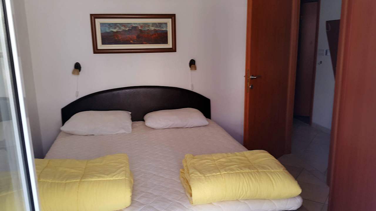 Sleeping room Montenegro Apartments complex - Norwegian village